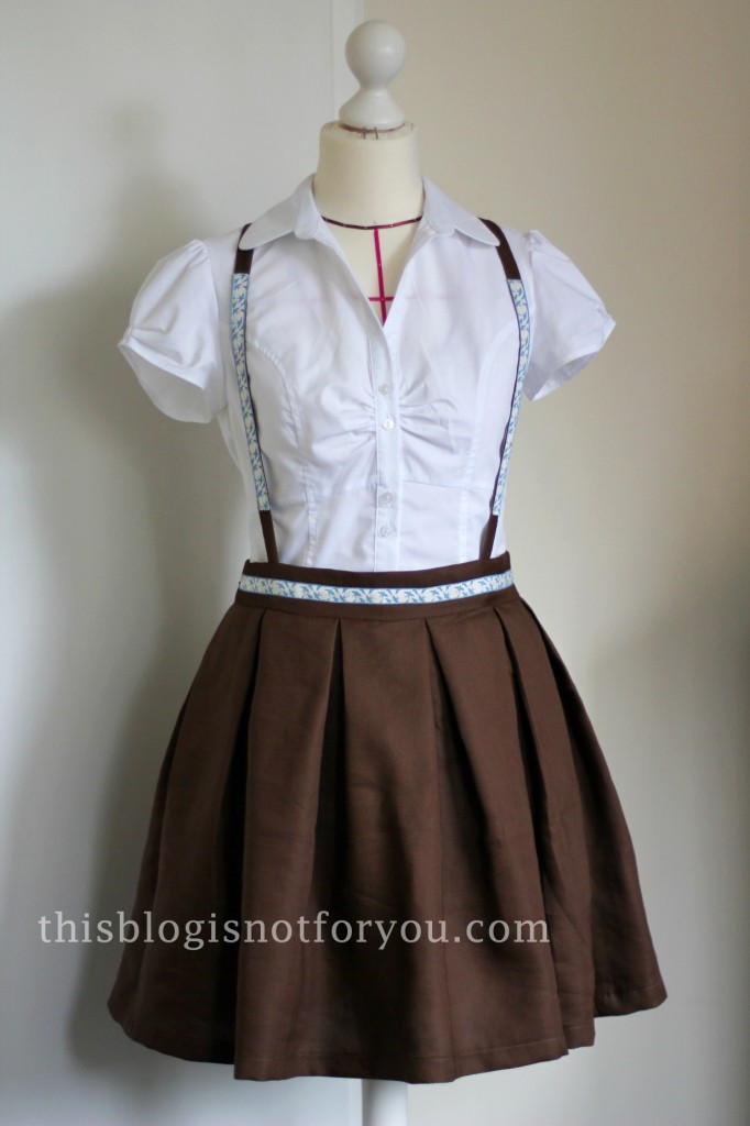 Get the look: Pleated Skirt with Suspenders and Vintage Trim