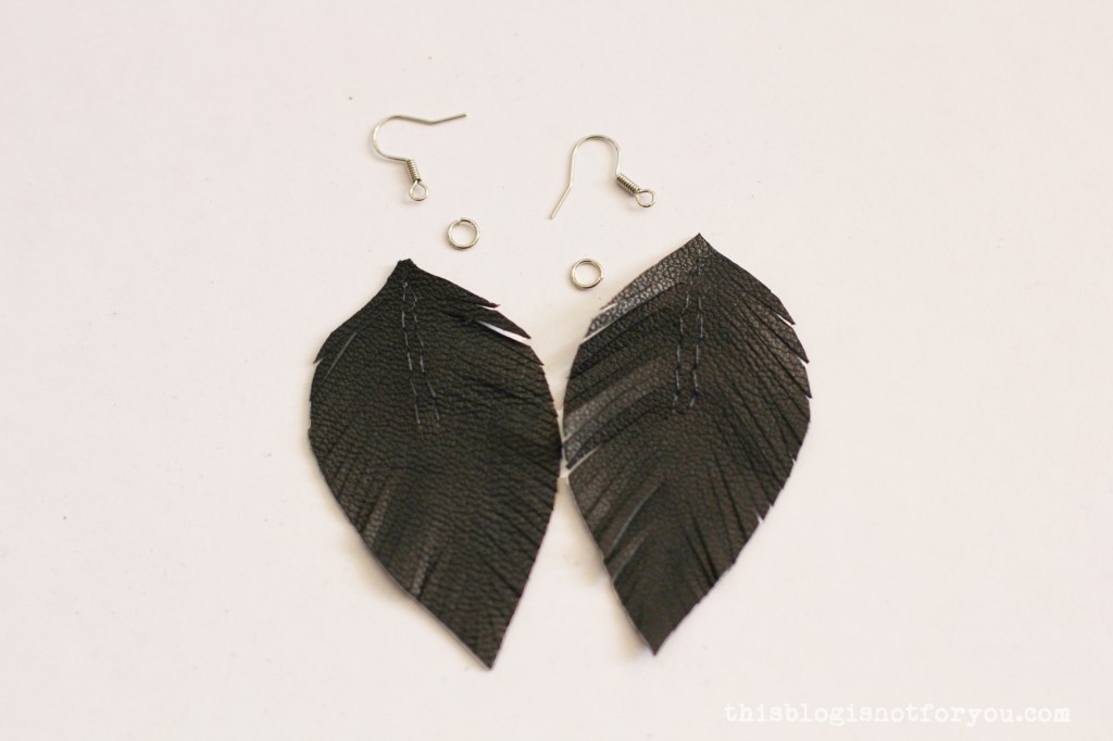 DIY leather feather earrings by thisblogisnotforyou.com